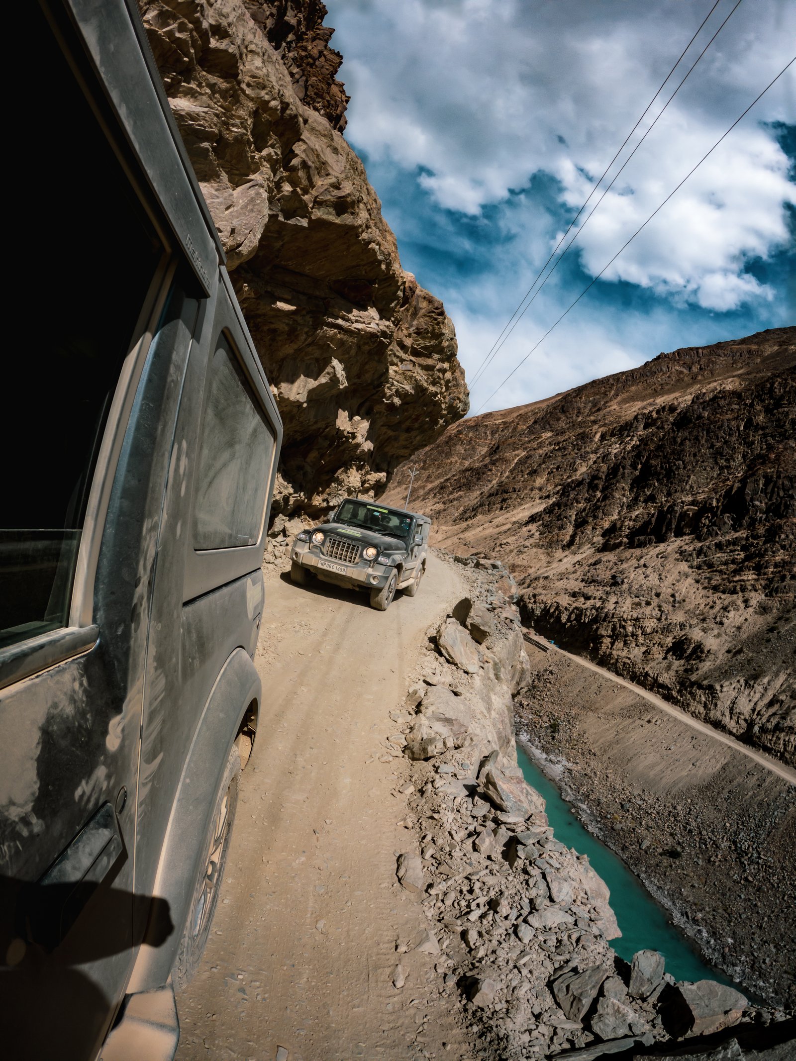 Mountain road winding through valleys